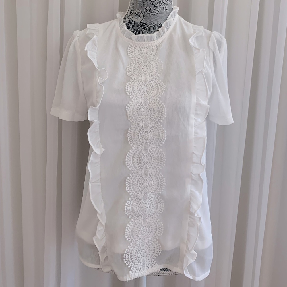 white top with lace and detailing